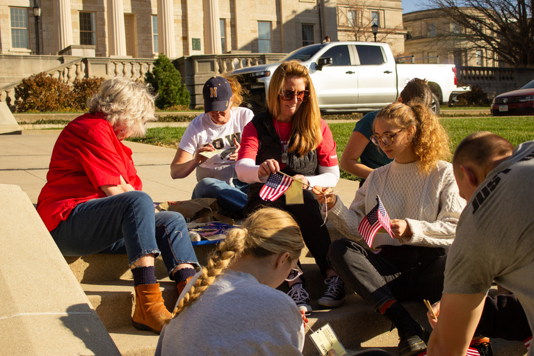 Volunteers putting together flags