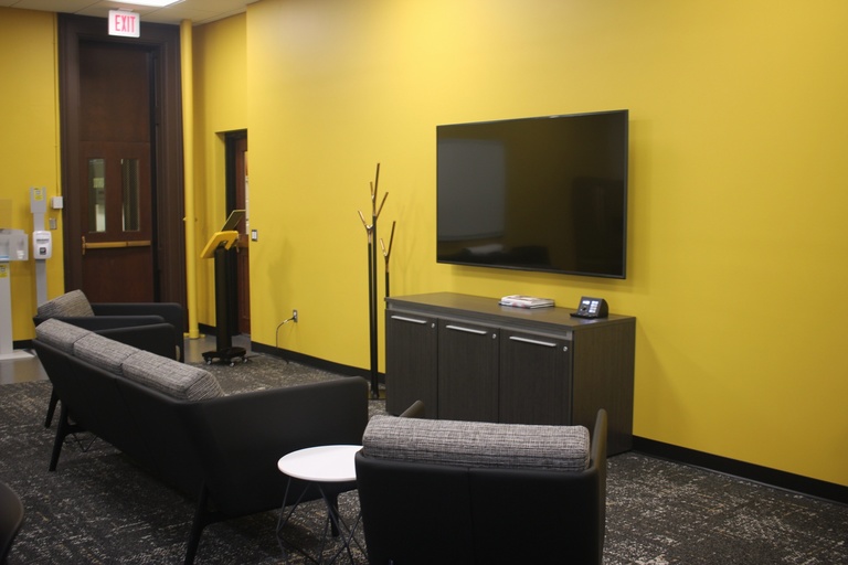 Photo of couch and tv in student lounge